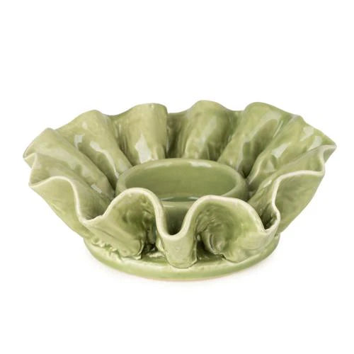Lifestyle shot of Flower Shaped Tealight Holder in Green, enhancing home decor with a serene ambiance, an essential flower tealight holder.