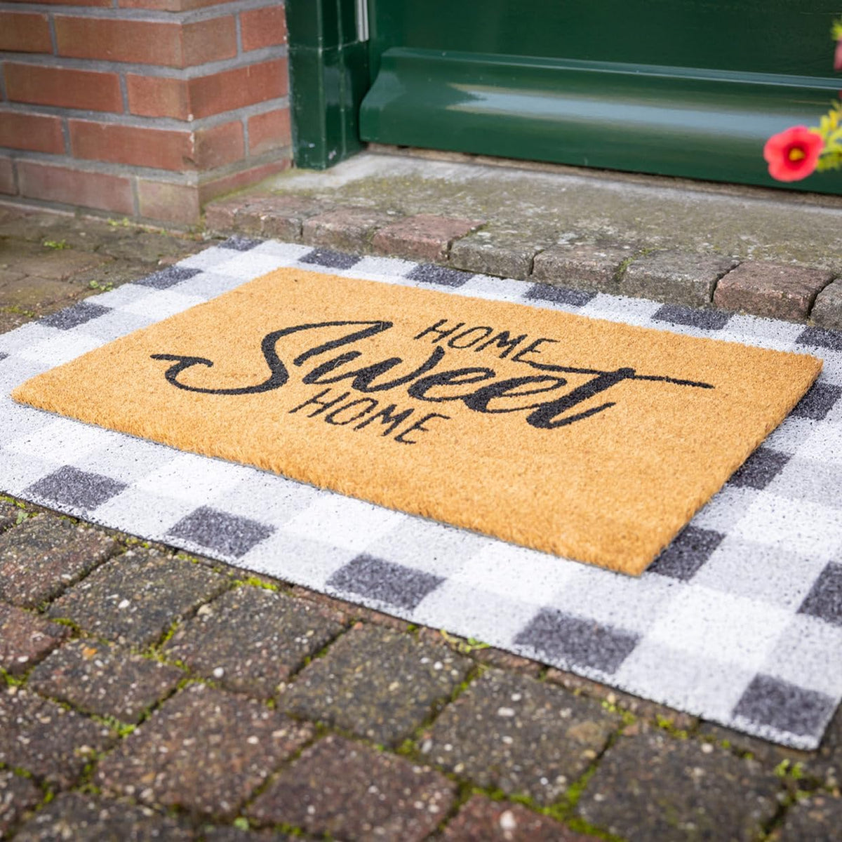 Close-up of the natural coir mat Home Sweet Home Mat, showcasing its thick coconut fibre material that enhances its non-slip qualities for both indoor and outdoor use.