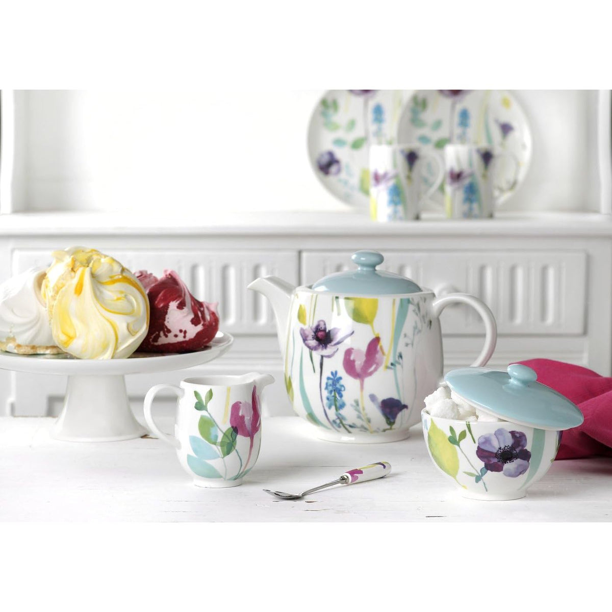 Beautifully arranged Portmeirion Water Garden 3 Piece Teapot Set, perfect for an inviting afternoon tea setting.