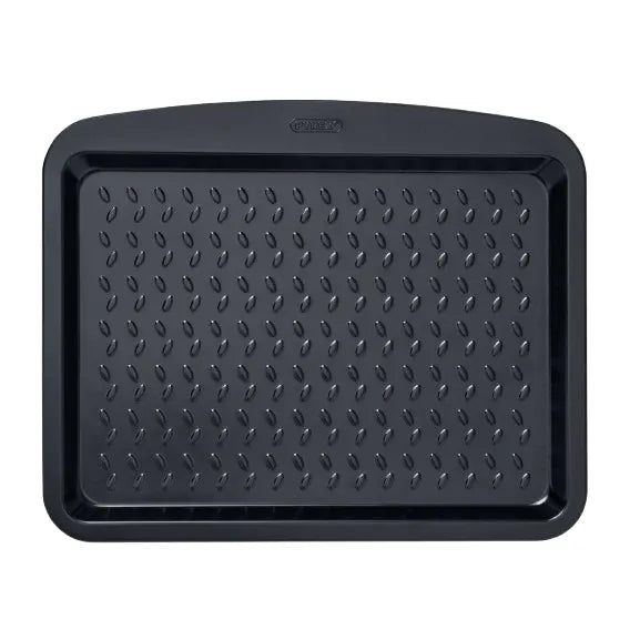 Pyrex Glide Oven Tray 34x24cm in use, demonstrating the benefits of a high-quality non-stick oven tray.