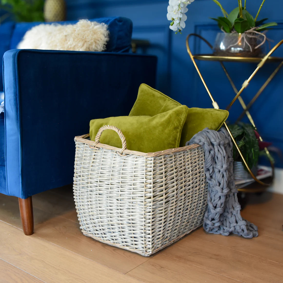 Chic grey rectangular log basket showcasing its dimensions, an essential for cozy nights.