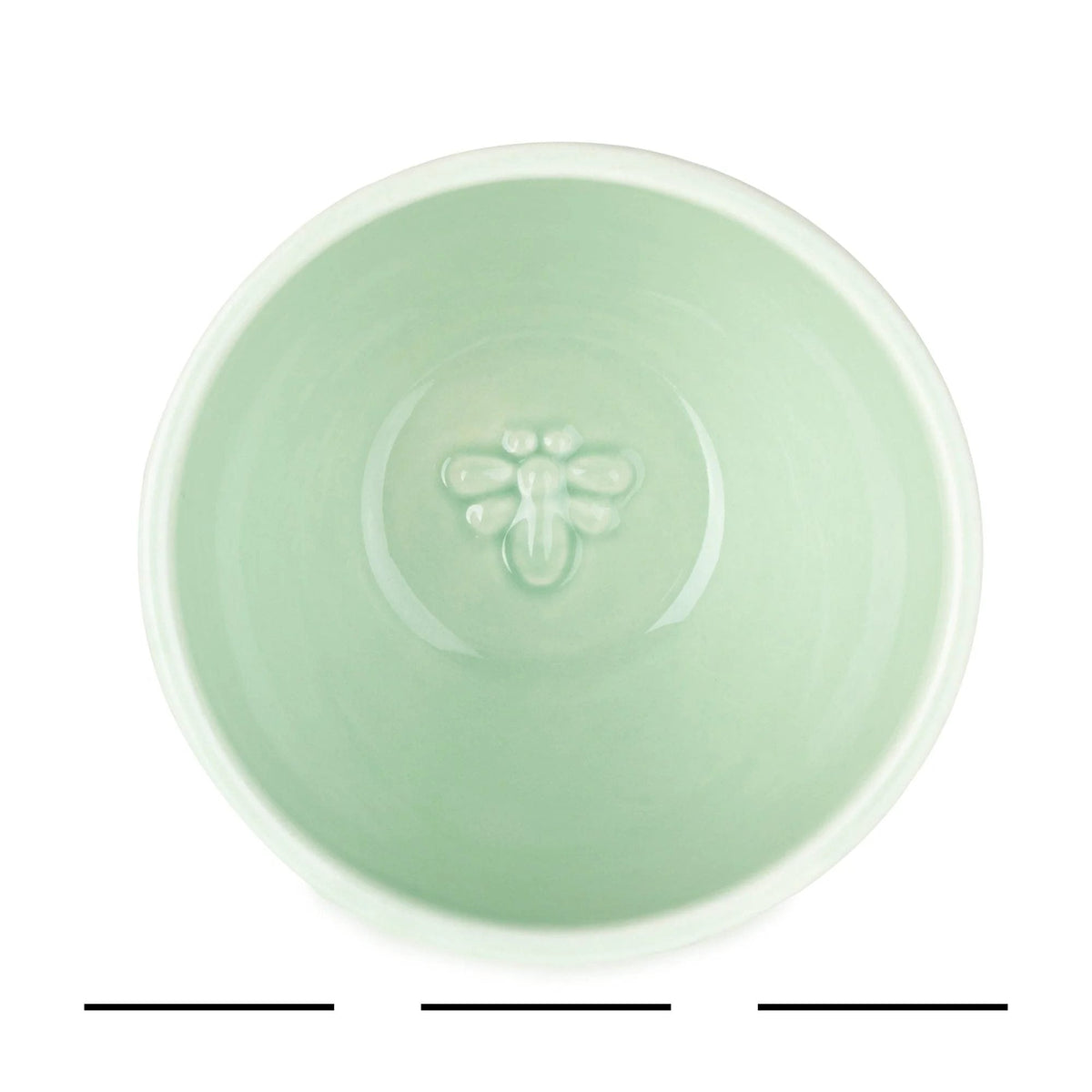 Detailed view of Home Deco London Ceramic Nibble Bowls, featuring embossed patterns in cream and mint green, ideal for entertaining.