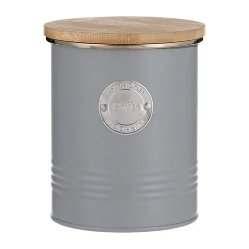 The bamboo lids of the Typhoon Living metal kitchen canister set featuring silicone seals for freshness, ideal for tea and coffee.