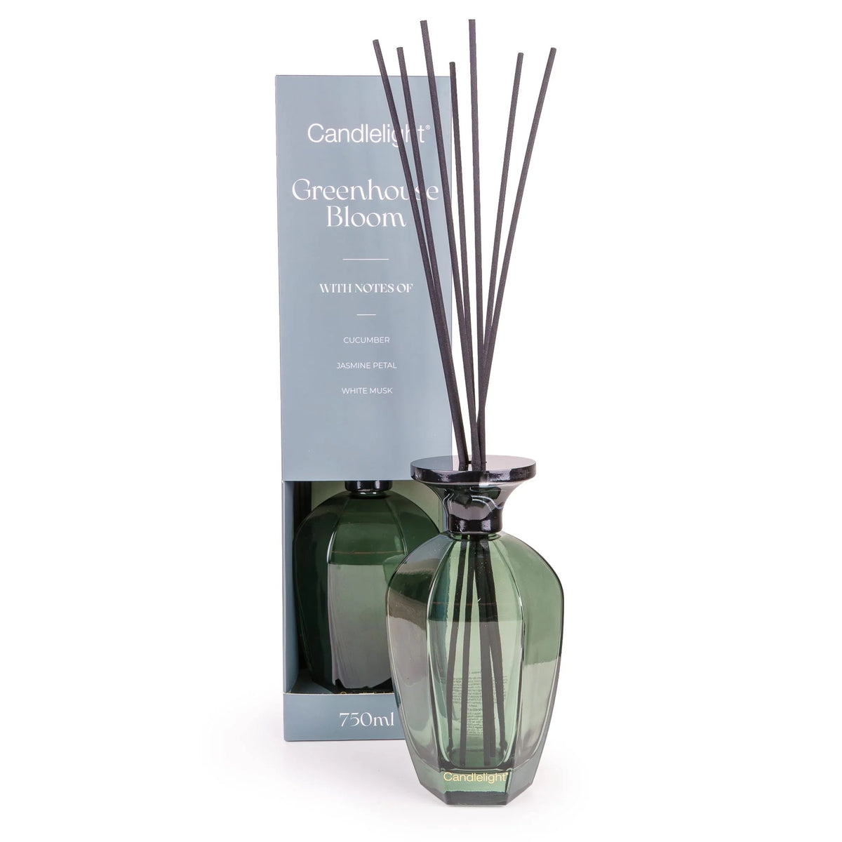 Green diffuser bottle with reeds and packaging labeled 'Greenhouse Bloom' on a white background