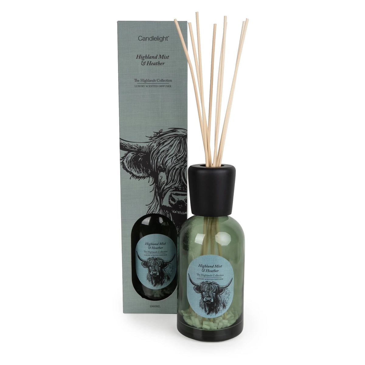 Reed diffuser with packaging featuring a highland cow design on a white background