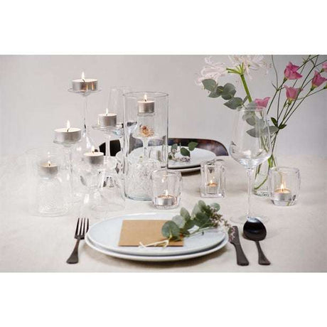A beautifully arranged display of tealight candles, showcasing their elegant glow in a home setting, illustrating how tealight candles add a touch of light and warmth.