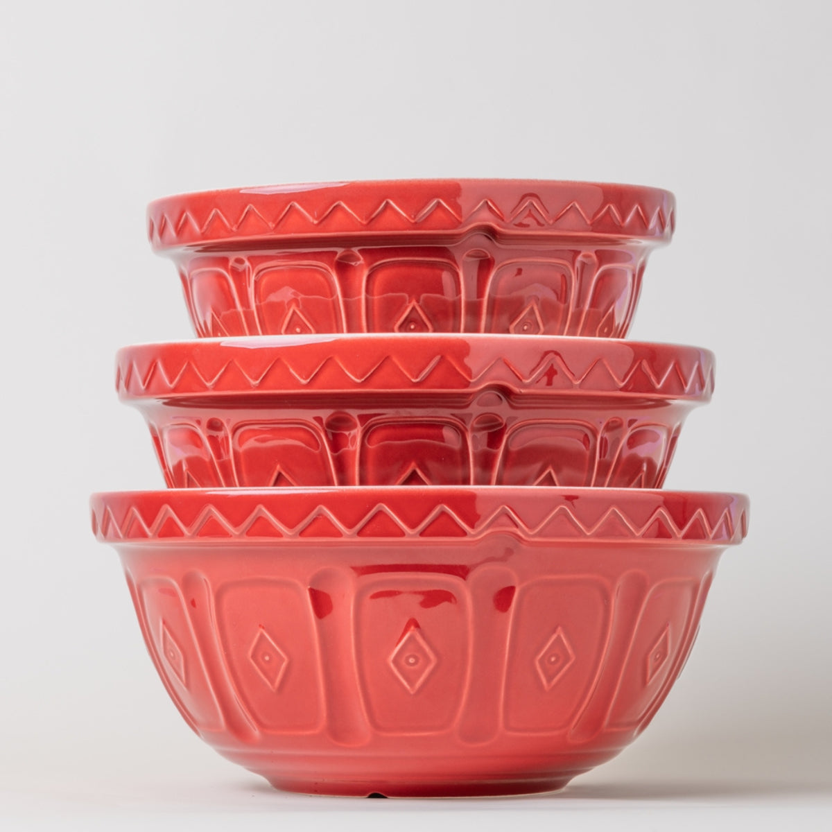 Mason Cash collection featuring durable stoneware mixing bowls in various sizes and colours, perfect for all baking needs.