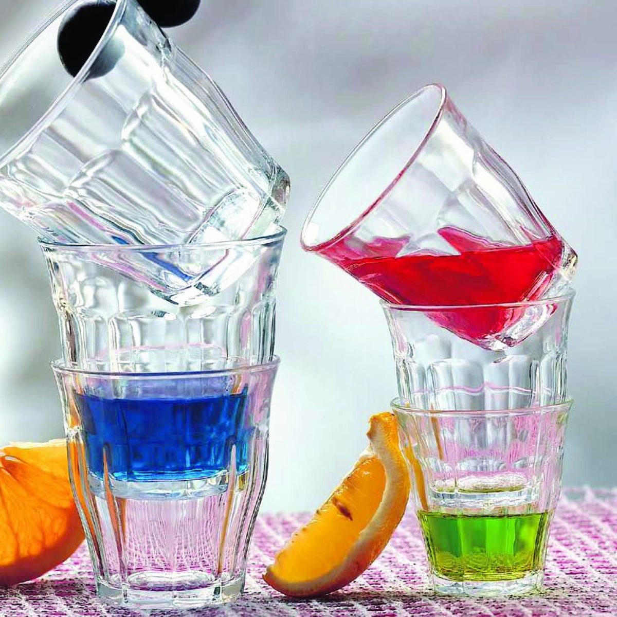Duralex tempered glassware collection featuring durable coffee mugs, whisky glasses, and mixing bowls.