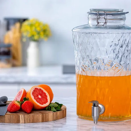 An assortment of drinks dispensers showcasing the best beverage dispensers for parties and events. Perfect for serving a variety of drinks.