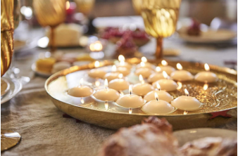 Collection of Tea Lights & Floating Candles featuring packs of unscented tealight candles for various occasions, including long burning options for lasting warmth and ambiance.