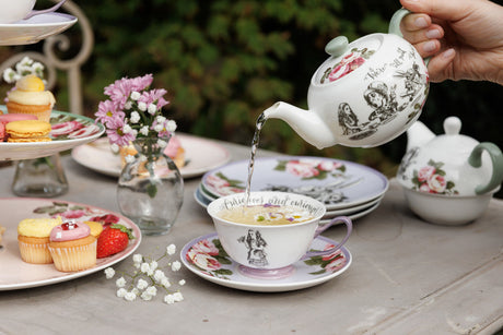 Mikasa and the V&A Alice In Wonderland Collection featuring elegant bone china tableware, showcasing stunning designs for tea service including mugs, teapots, and cake stands. Perfect for Alice in Wonderland tableware enthusiasts.