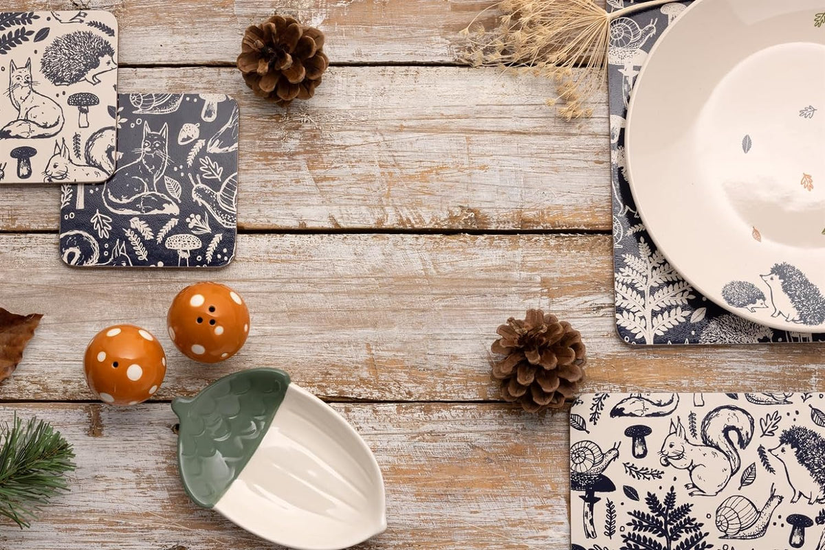 Stylish placemats and coasters collection featuring rustic designs and vibrant motifs for an elegant table setting.