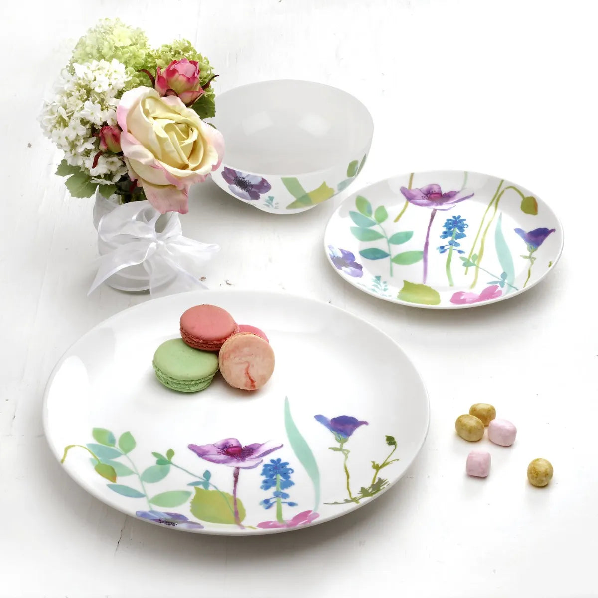 A beautifully arranged table setting with the Portmeirion Water Garden 12 Piece Dinner Set, illustrating its elegant floral dinner set design.