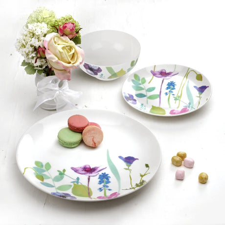 A beautifully arranged table setting with the Portmeirion Water Garden 12 Piece Dinner Set, illustrating its elegant floral dinner set design.