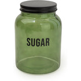 A stylish Olives Apothecary glass jar with black lid, ideal for storing tea coffee sugar and enhancing kitchen décor.