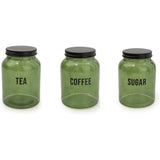 Olives Apothecary green glass canister with black lid for tea coffee sugar storage, perfect for kitchen organization.