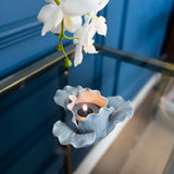 Elegant close-up of the Flower Shaped Tealight Holder - Blue, showcasing the delicate design of this flower tealight holder.