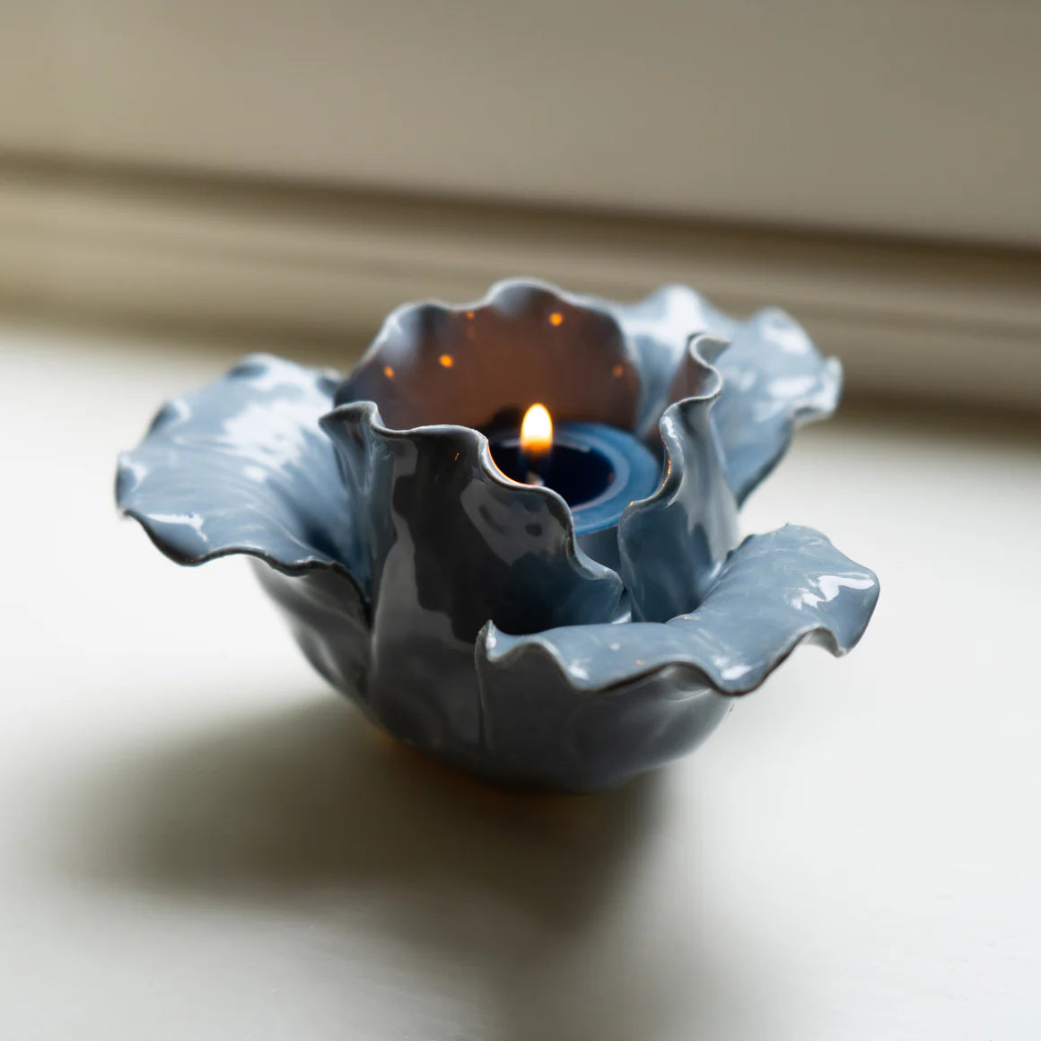 Flower Shaped Tealight Holder - Blue, a beautiful flower tealight holder ideal for creating a serene ambiance.
