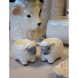 Julia Sheep Ceramic Set of 2 Egg Cups styled with breakfast, emphasizing their charm as ceramic sheep egg cups for a farmhouse kitchen.