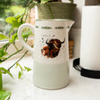 Elegant Highland Cow Ceramic Jug showcasing rustic charm, ideal for country-style home decor, featuring a highland cow jug design.