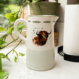 Elegant Highland Cow Ceramic Jug showcasing rustic charm, ideal for country-style home decor, featuring a highland cow jug design.