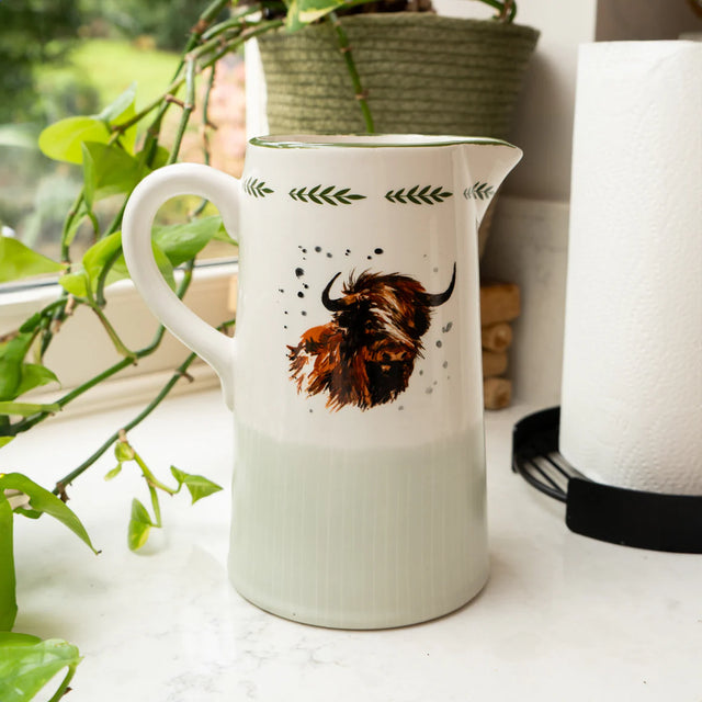 Elegant Highland Cow Ceramic Jug showcasing rustic charm, ideal for country-style home decor, featuring a highland cow jug design.