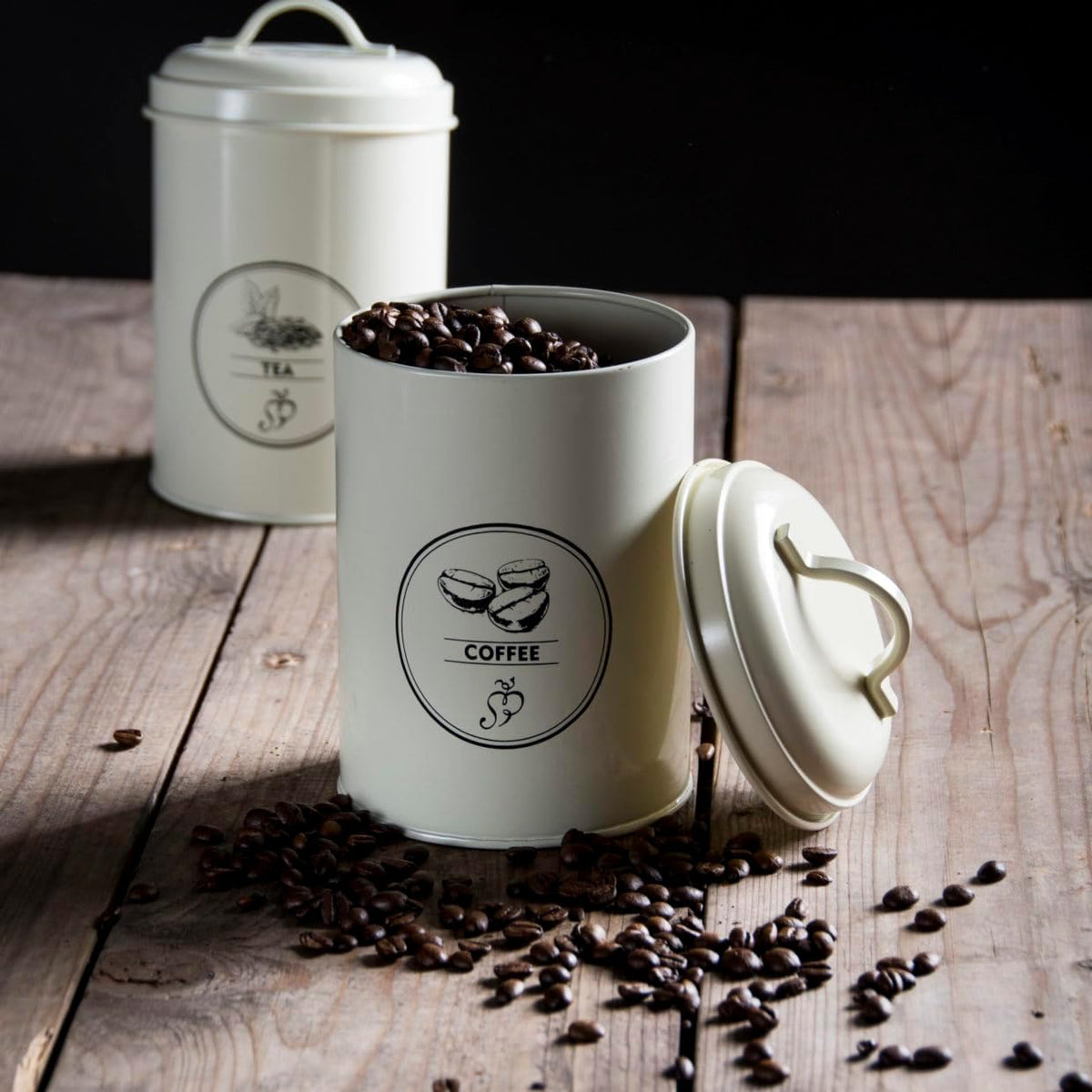 Stylish metal tea, coffee, and sugar canisters set of 3, ideal for farmhouse kitchen storage.