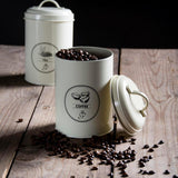 Stylish metal tea, coffee, and sugar canisters set of 3, ideal for farmhouse kitchen storage.