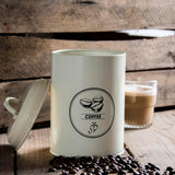 Easy to clean cream tea, coffee, and sugar canisters for a neat farmhouse kitchen storage solution.