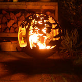 Design details of the fire ball laser cut rust woodland laser cut fire pit focusing on its quality craftsmanship.