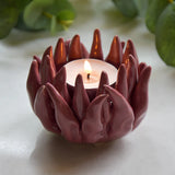 Close-up view of Flower Shaped Tealight Holder in pink, showcasing the delicate petals of this flower tealight holder.