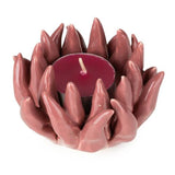 Flower Shaped Tealight Holder in pink with tealight lit, demonstrating the warm glow of this elegant flower tealight holder.