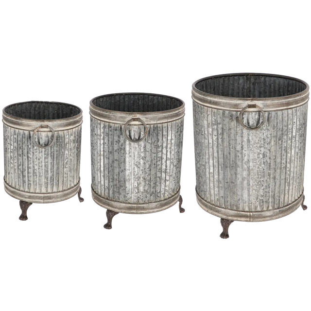 Footed planter round set of 3 ZINC featuring a classic ribbed design and sturdy lion’s paw legs, perfect for displaying flowers, herbs, and small shrubs. Ideal zinc footed planters for garden or balcony decor.