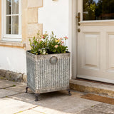 Elegant footed planter square set of 3 zinc - stylish outdoor garden planters ideal for showcasing small shrubs and plants.