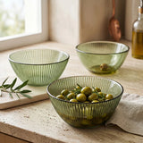 Set of 3 elegant green glass bowls with a ridged design in olive green, perfect for serving salads and snacks.