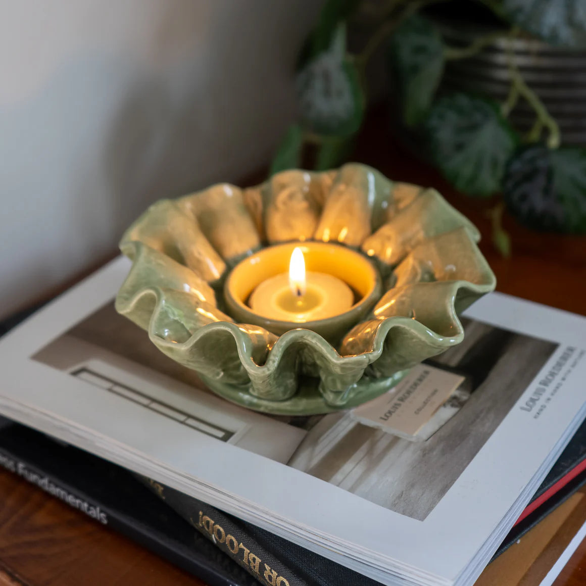 Elegant Flower Shaped Tealight Holder in Green, showcasing beautiful curves and details, perfect as a floral-inspired decor piece and flower tealight holder.