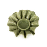 Flower Shaped Tealight Holder - Green displayed with a tealight candle, showcasing its functionality and charm as a beautiful flower tealight holder.