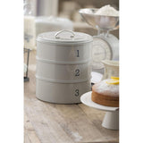 Stylish Living Nostalgia 3-Tier Metal Cake Storage Tin that locks in freshness for your baked treats.