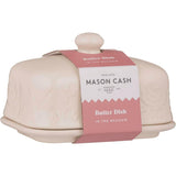 A beige Mason Cash stoneware butter dish with embossed floral design, including a lid with a knob on top. Mason Cash Meadow butter dish with Lid cream  with branding