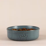 Mason Cash Reactive Paw Large Dog Bowl shown filled with water, demonstrating its 950ml capacity and practical use as a stoneware pet bowl.
