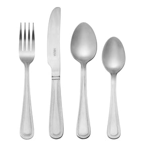 Mikasa Portobello Stainless Steel Cutlery Set, 16 Piece displayed elegantly on a wooden dining table showcasing its classic rounded silhouette.
