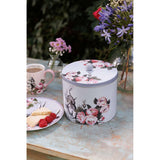 Elegant Mikasa and V&A Alice In Wonderland Biscuit Tin with intricate floral patterns, perfect for gifting.