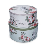 Mikasa and V&A Alice In Wonderland Cake Tins displayed together, emphasizing their quality and UK design.