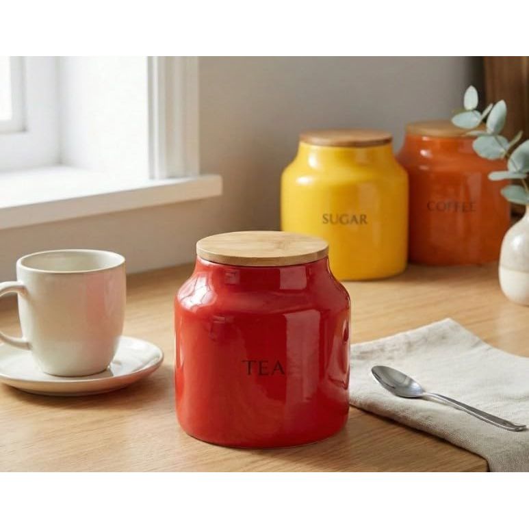 Durable Tomato Ceramic Tea Coffee Sugar Canisters with bamboo lids, designed to preserve freshness and add a pop of colour to your countertop.