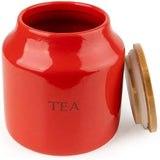 Stylish bamboo lids on Tomato Ceramic Tea Coffee Sugar Canisters, designed to seal in freshness while enhancing your kitchen decor.