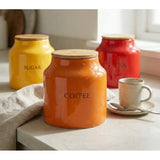 Tomato Ceramic Tea, Coffee and Sugar Canister Set, multicolour collection perfect for organized countertops and cheerful kitchen aesthetics.
