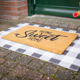 Close-up of the natural coir mat Home Sweet Home Mat, showcasing its thick coconut fibre material that enhances its non-slip qualities for both indoor and outdoor use.