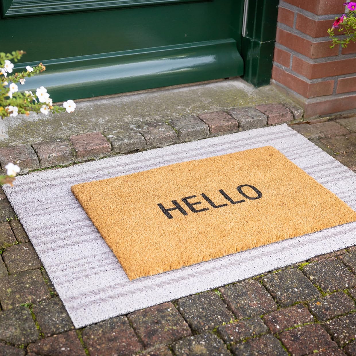 Close-up view of the Hello Coir Mat showcasing its natural coir fiber texture, ideal for keeping your entrance clean.