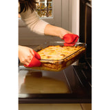 O'Cuisine Large Roasting Dish being removed from the oven, showcasing its versatility for baking lasagna.
