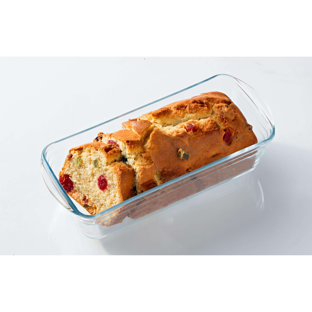 A freshly baked loaf in an Ôcuisine® Loaf Dishes Glass Baking Bread Dishes, demonstrating the usage of a borosilicate glass baking dish for creating delightful homemade bread.